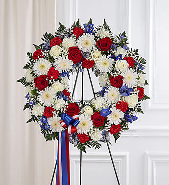 Serene Blessings™ Standing Wreath- Red, White & Blue Flower Bouquet